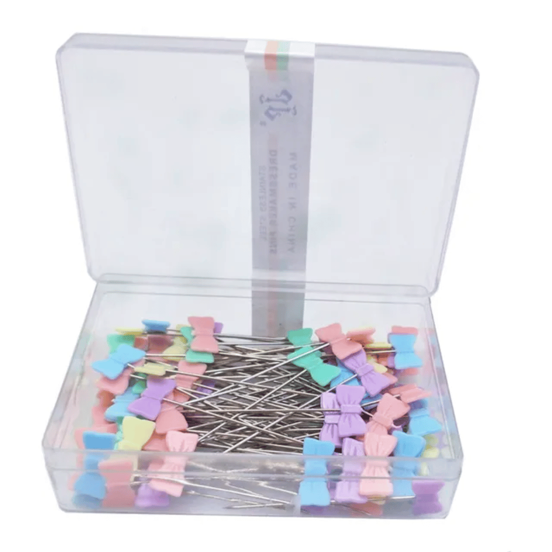 A clear plastic box of Quilting Pins 50 pcs featuring vibrant, flower-shaped sewing pins perfect for crafting projects.
