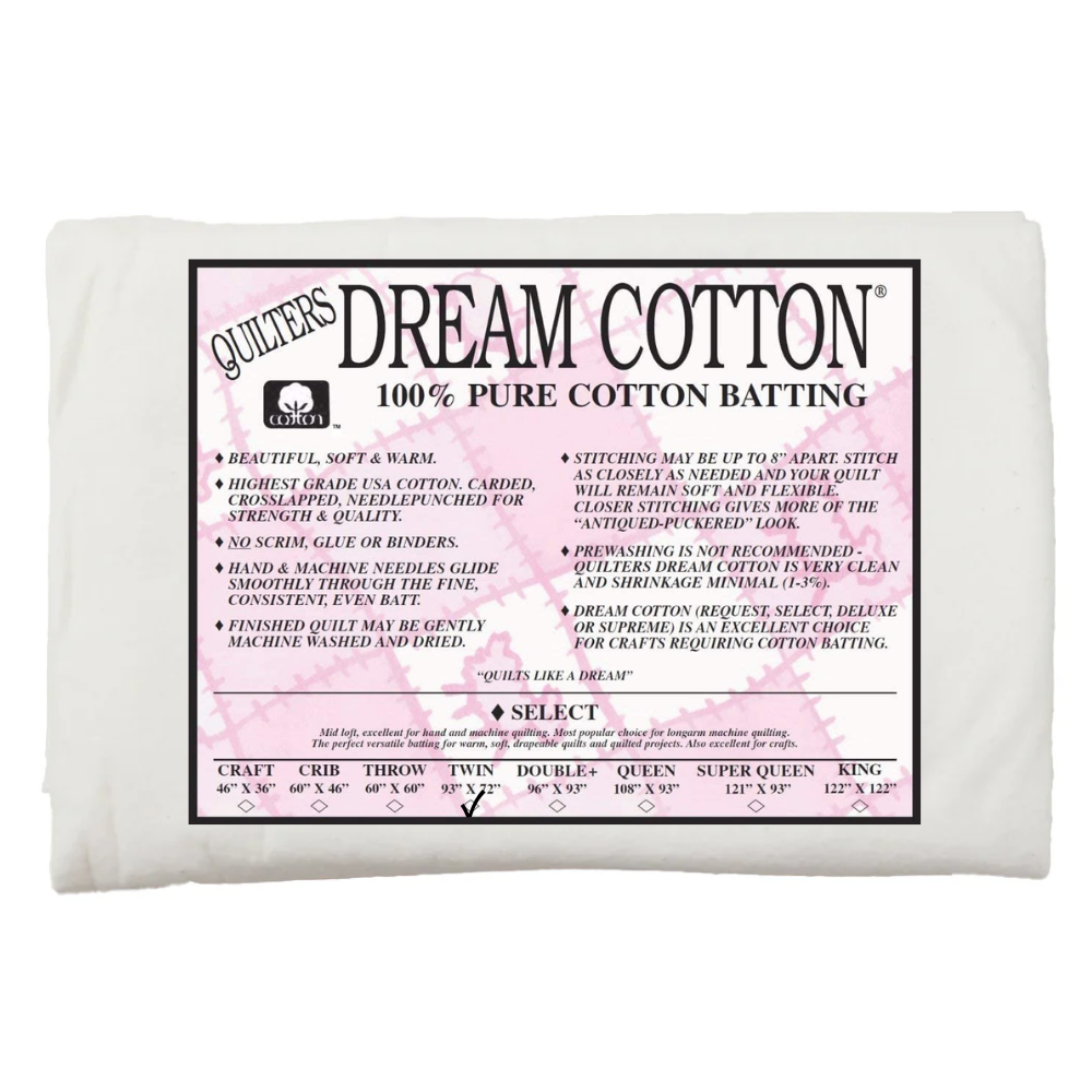 A 93" x 72" Mid Loft 100% Cotton Batting by Quilter's Dream, ideal for quilting, includes product features, care instructions, and available sizes on the label to support smooth stitching for your projects.