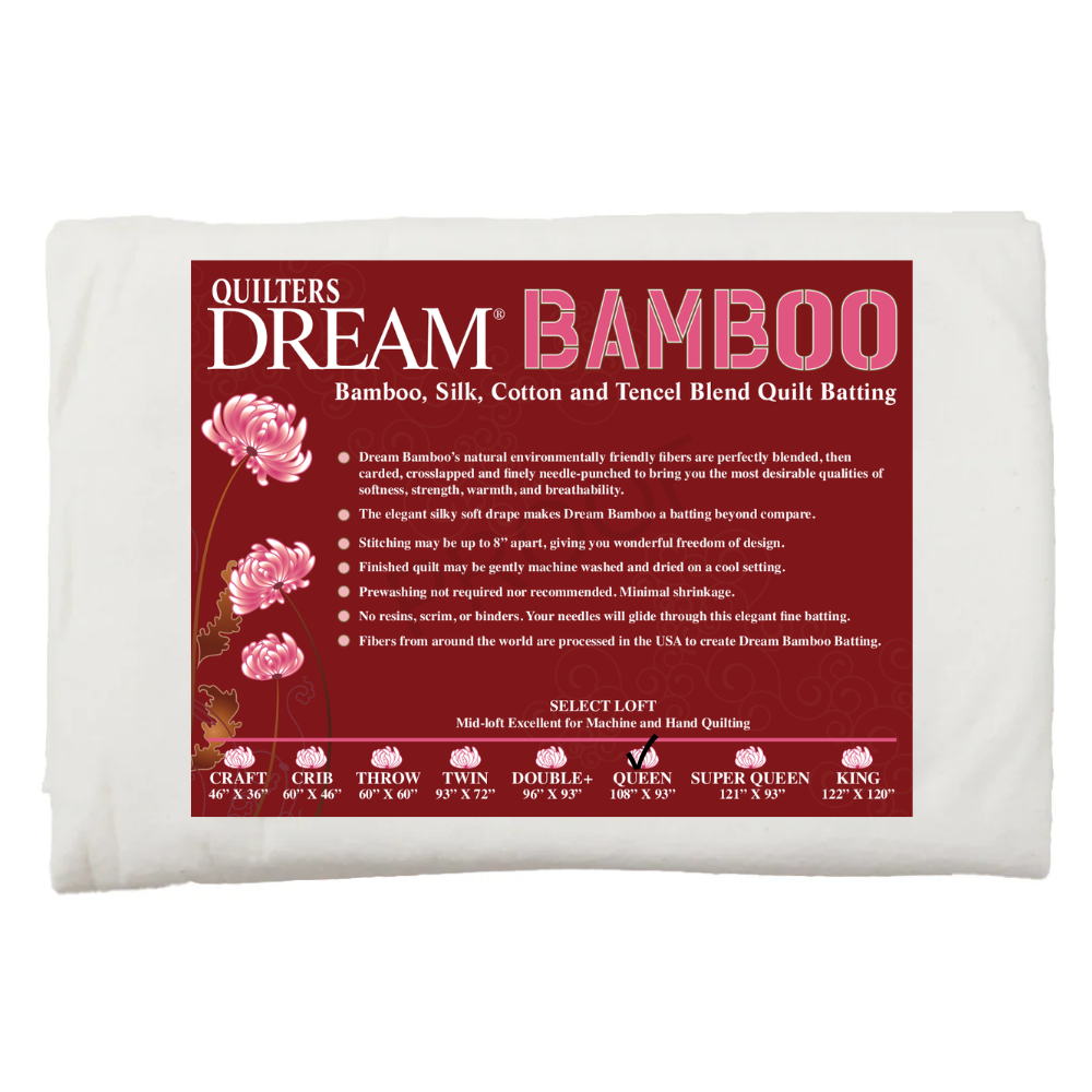 A package of Quilter’s Dream 108" x 93" Mid Loft Bamboo Batting, shown with product details and description on a maroon label with floral graphics.