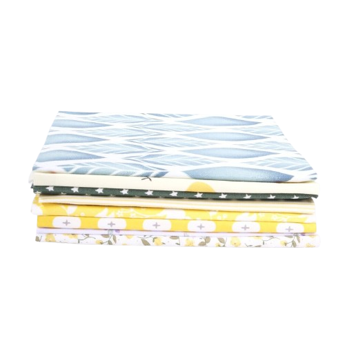 The Sunshine Stitches - Fat Quarter Bundle features folded fabrics in playful patterns: blue geometric, stars, leaves, and florals. Bursting with vibrant hues of blue, yellow, and white, it's perfect for colorful, creative projects.