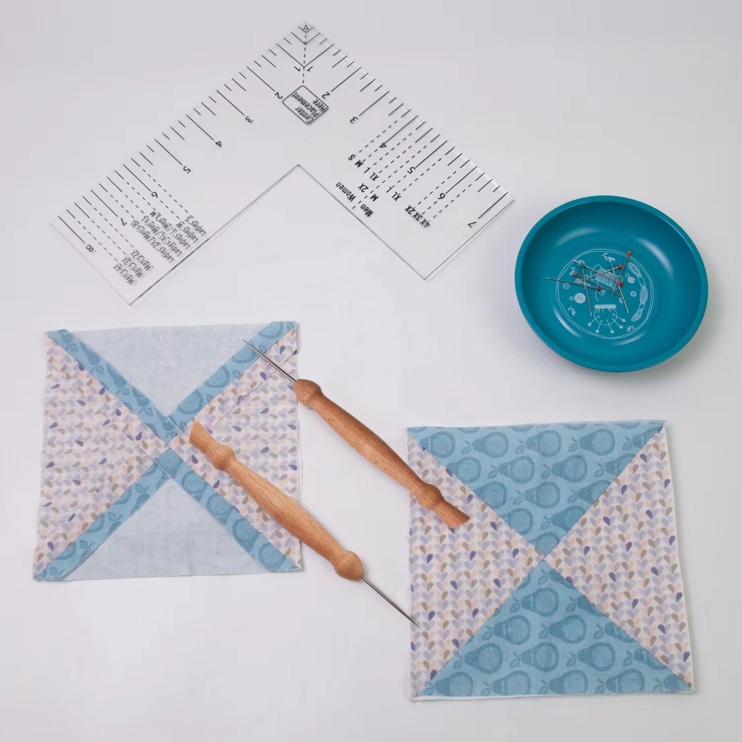 2 stiletto pressing tools with a set square triangle ruller