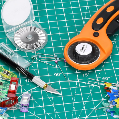 The 97-Piece Quilting Kit: Perfect for Beginners includes essentials like a rotary cutter, craft knife, pins, clips, and wavy blade—all arranged on a green cutting mat with measurement grids.