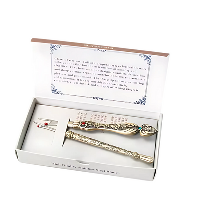 The Vintage Seam Ripper Set includes a gold-colored tool with ergonomic handle, a cleaning cloth, and an informational card, all presented in a white box labeled "High Quality Nib" for vintage charm.