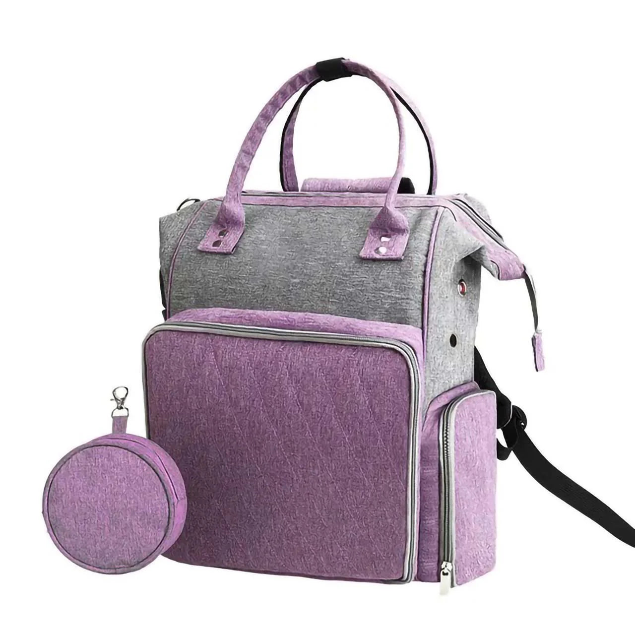 The Wooden Sewing Box with Handle (Images54) is a purple and gray backpack with multiple compartments, ideal for sewing supplies, and includes a small round accessory pouch.