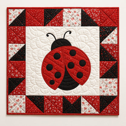 The Ladybug Downloadable PDF Quilt Pattern features a nature-inspired square quilt with a red and black ladybug center, bordered by red, black, and white triangles—ideal for intermediate quilters.