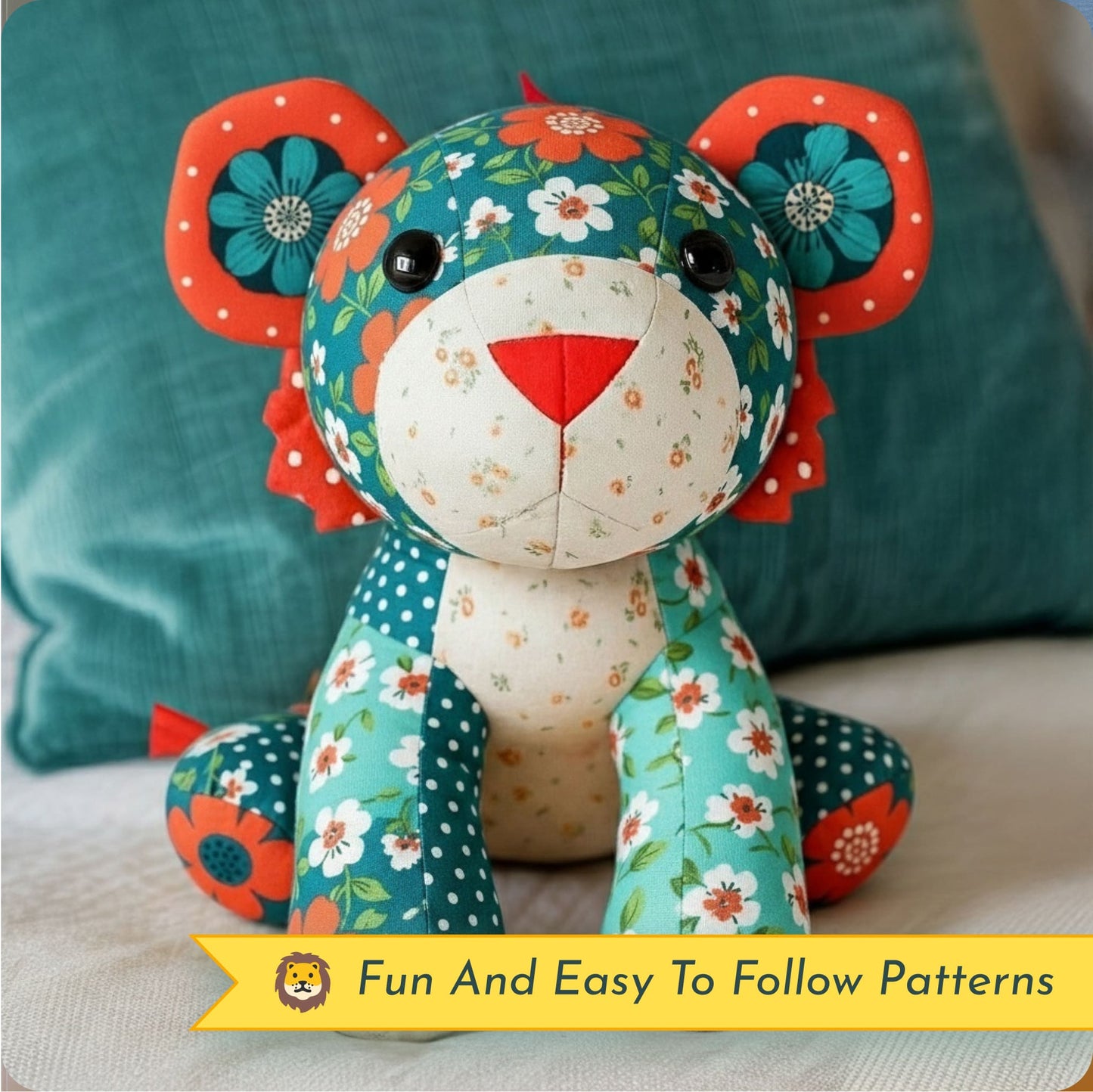 A colorful stuffed lion made from the Mrs. Quilty Plushies – Bundle of 14 Quilted Patterns sits on a bed with teal pillows, highlighting the charm of handmade toys. A banner below reads "Fun And Easy To Follow Patterns.