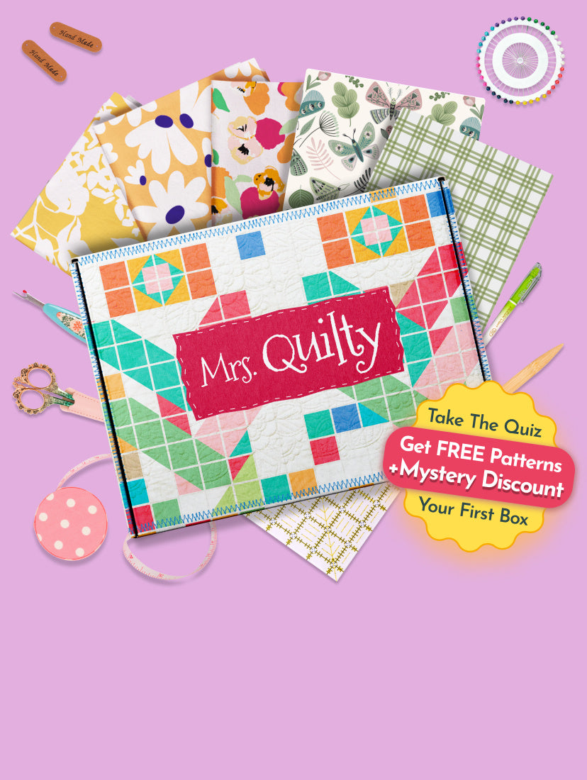 Mrs. Quilty starter box with colorful quilting fabrics, tools, and free patterns with a mystery discount
